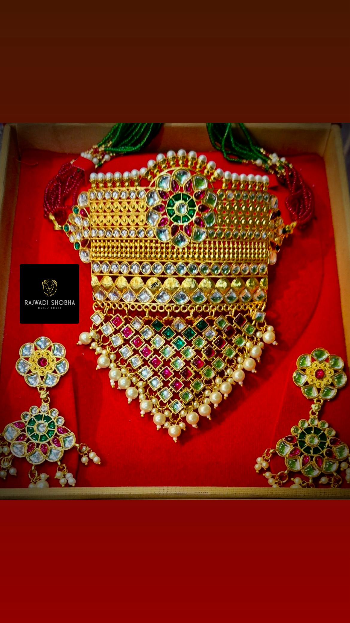 Indian-style gold-plated necklace and earrings set crafted with intricate detailing