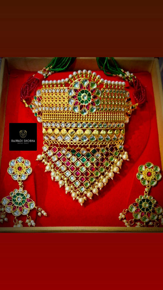 Indian-style gold-plated necklace and earrings set crafted with intricate detailing