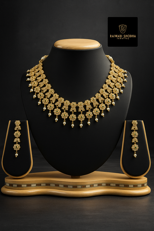 Elegant gold artificial necklace with matching earrings, showcasing a refined design suitable for formal occasions.