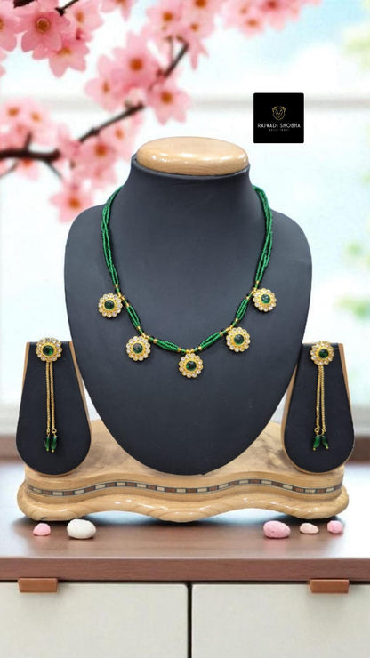 Green and Red Necklace paired with matching earrings