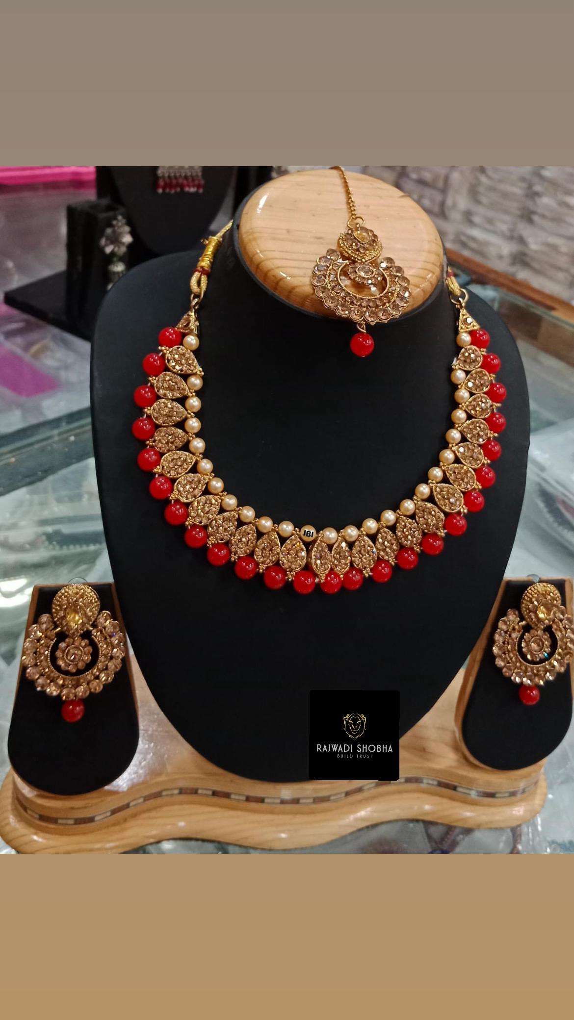Red and Gold Necklace Set, featuring a beautifully crafted necklace paired with matching earrings